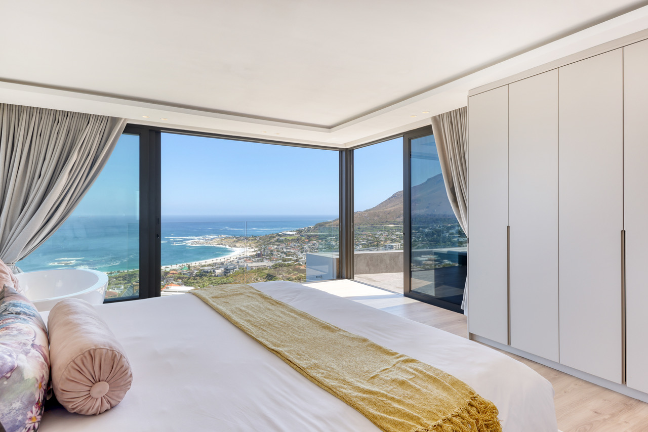 Master bedroom composed around privacy and long ocean views