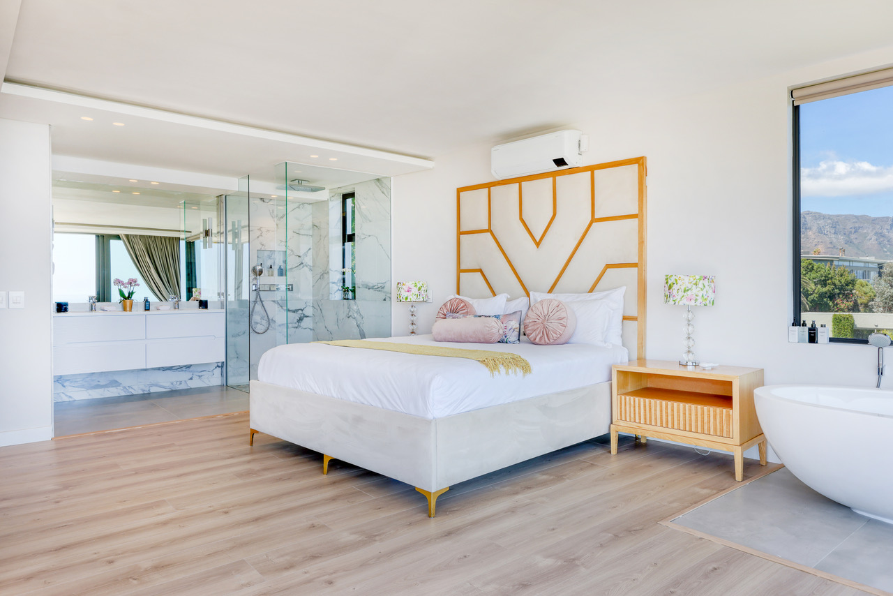 Penthouse master bedroom with elevated ocean-facing calm